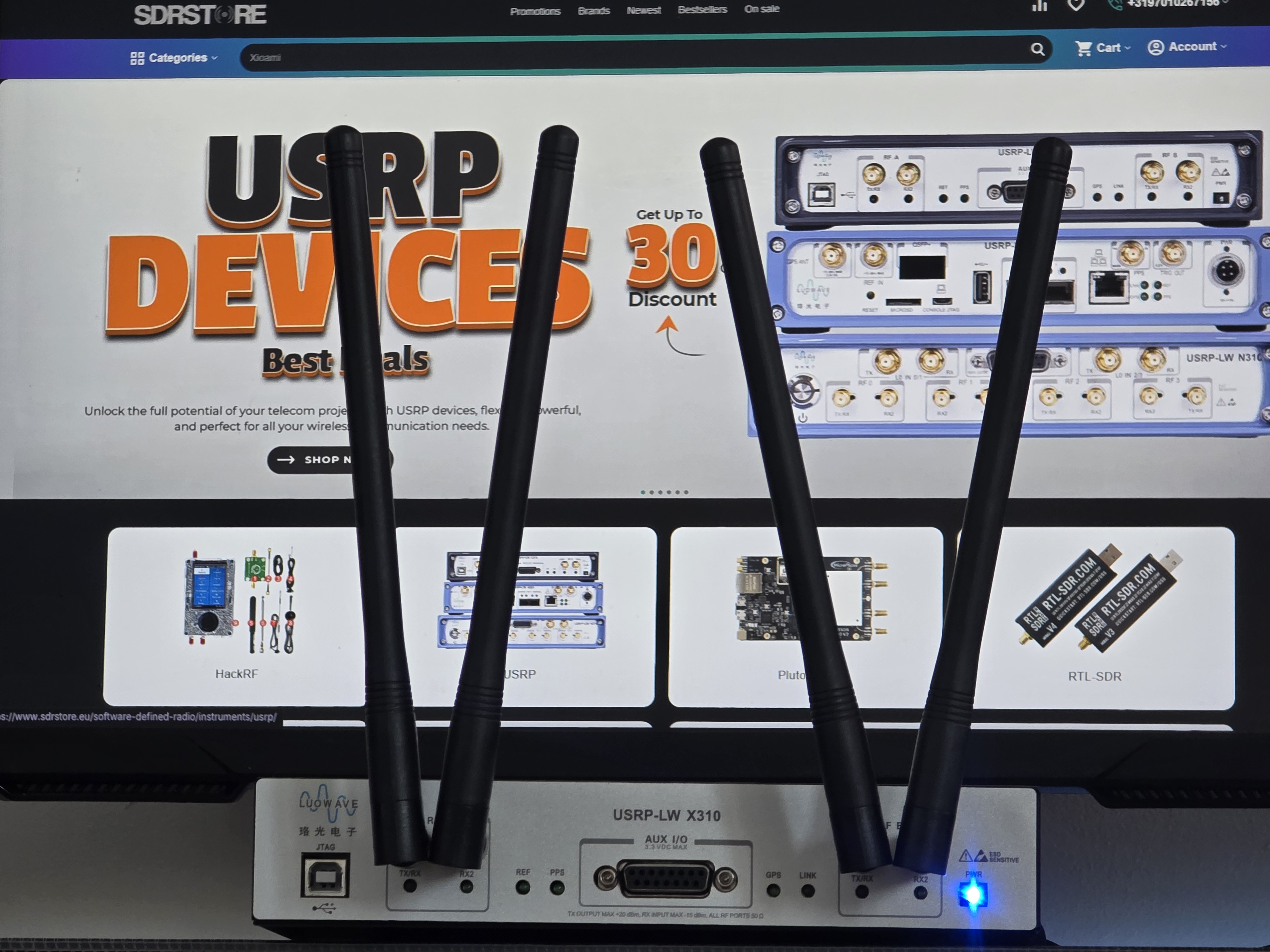 USRP X310 front panel showing SMA connectors, LED indicators and professional finish